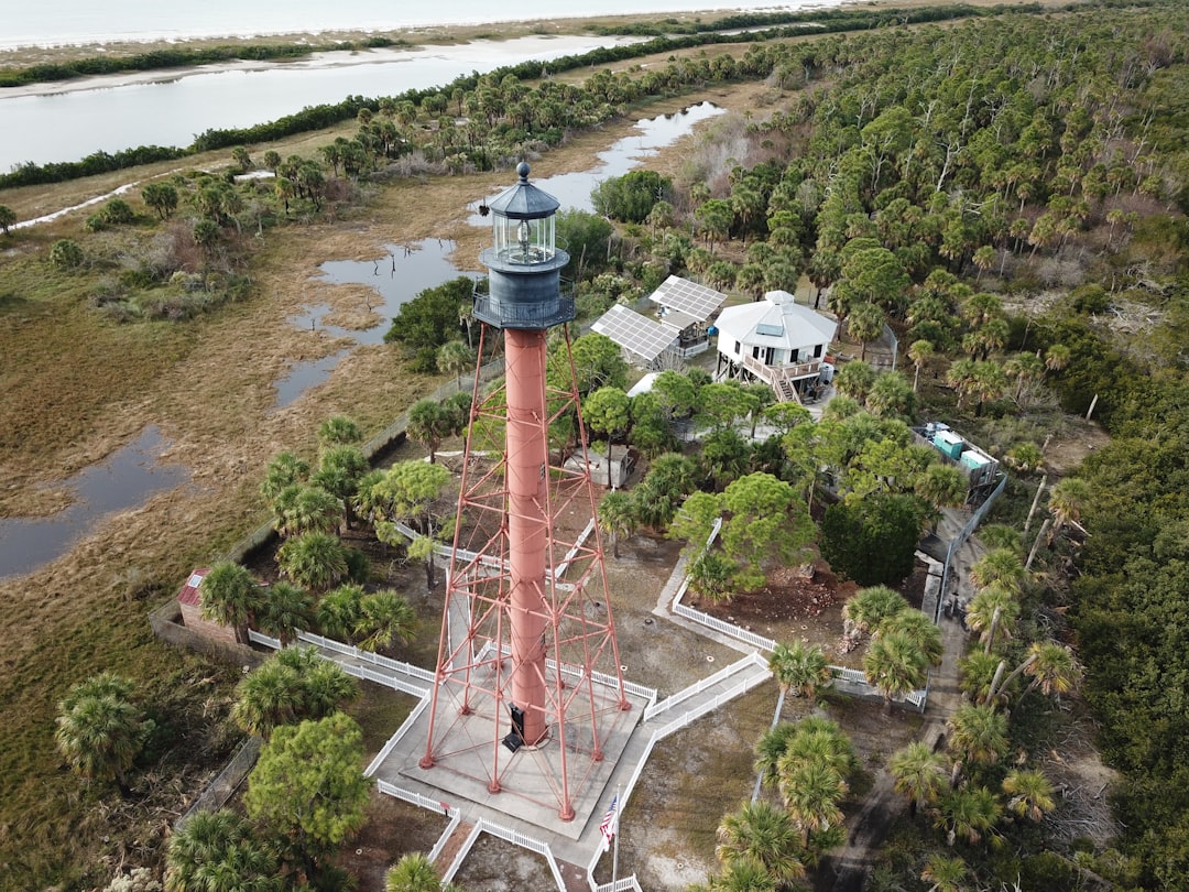 The Cape St. George Lighthouse above the palmettos on St George Island, Florida