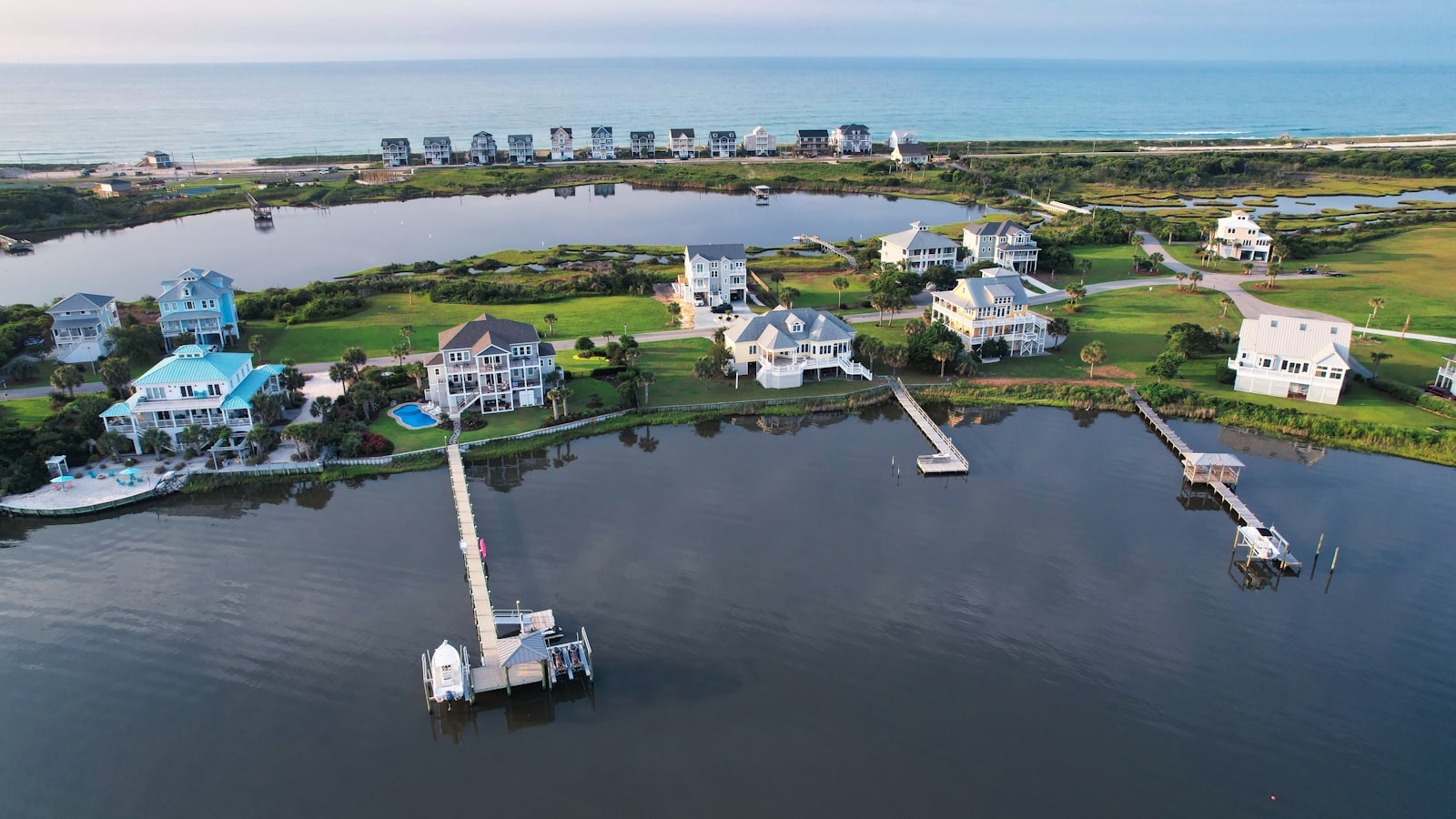 Soundfront houses with private docks and the ocean beyond at Duck, North Carolina