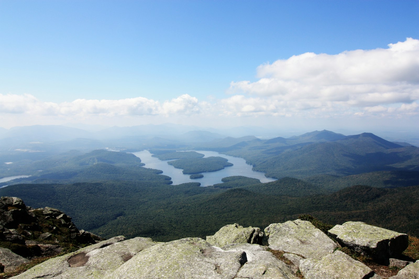 View over Lake Placid and the Adirondack High Peaks from a rocky summit in New York