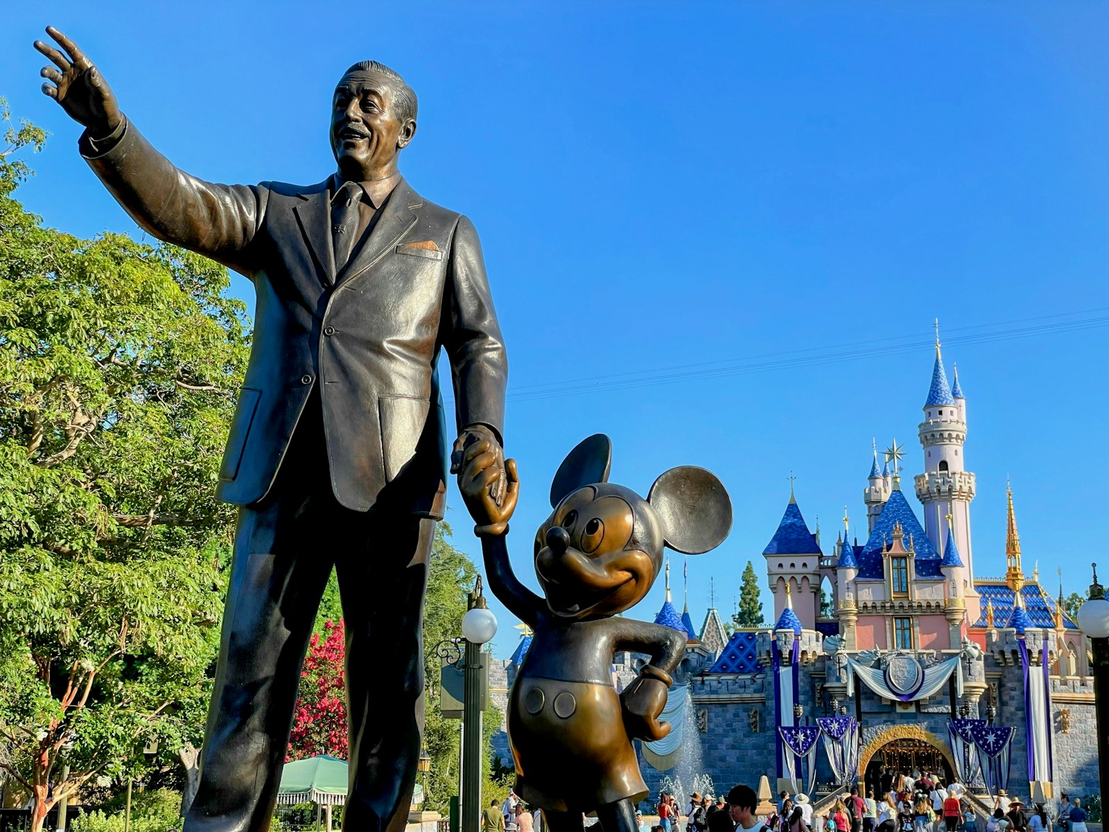 The Partners statue and Sleeping Beauty Castle at Disneyland in Anaheim, California